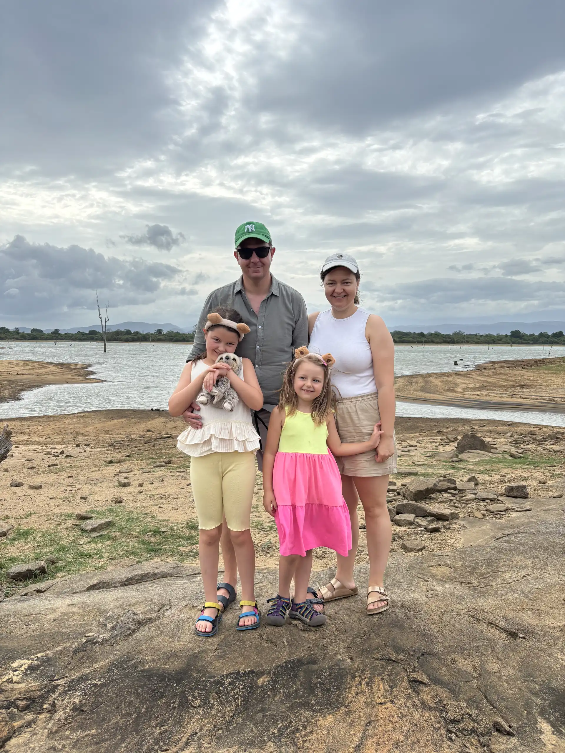 Family of safari guests at the lakeside, Udawalawe National Park, Sri Lanka
